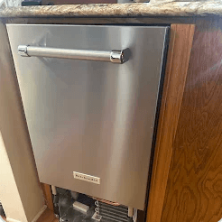 Customer photo of a built-in kitchen ice maker